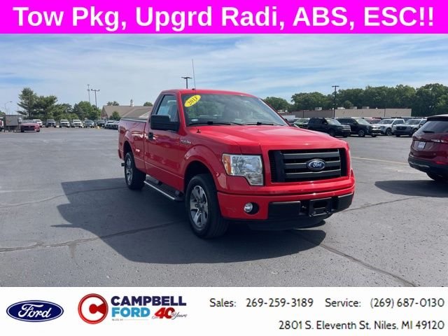 Used 2011 Race Red Ford STX image 1
