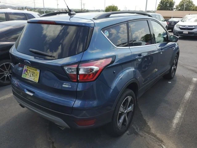 Used 2018 Blue Metallic Ford SEL image 4