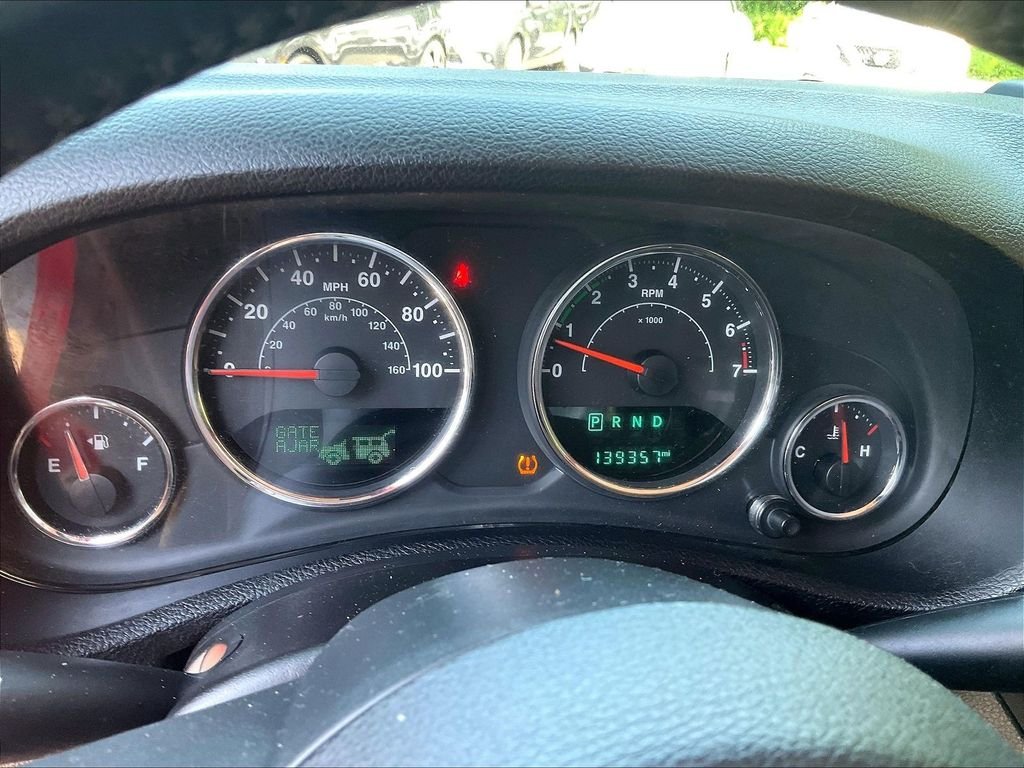 Used 2015 Red Jeep Unlimited Sahara image 15
