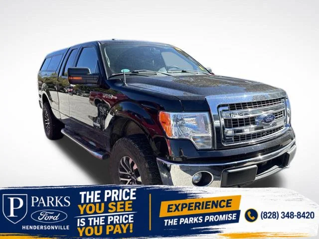 Used 2014 Tuxedo Black Metallic Ford XLT image 1
