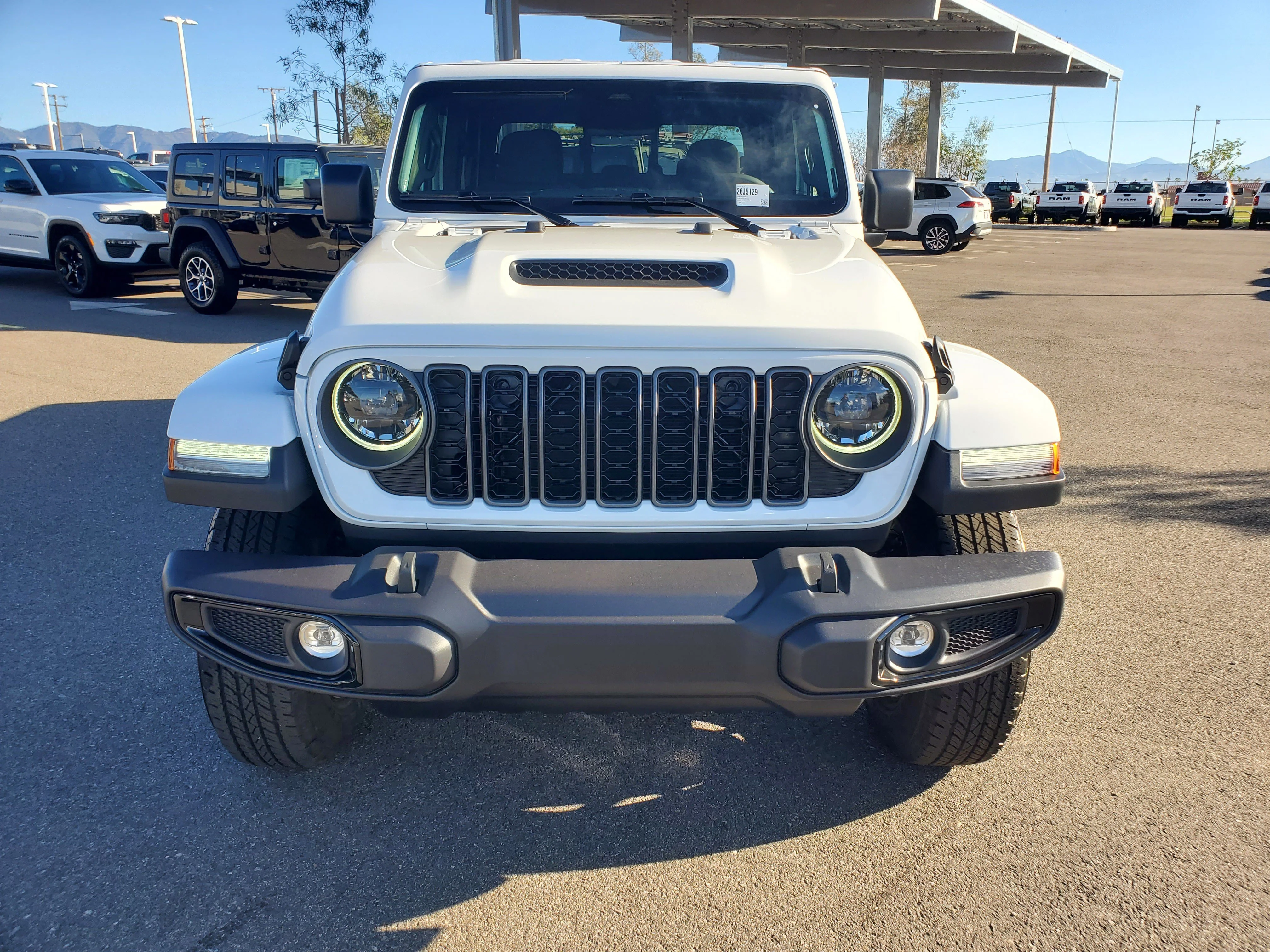 New 2026 Bright White Clear-Coat Exterior Paint Jeep Sport S image 9