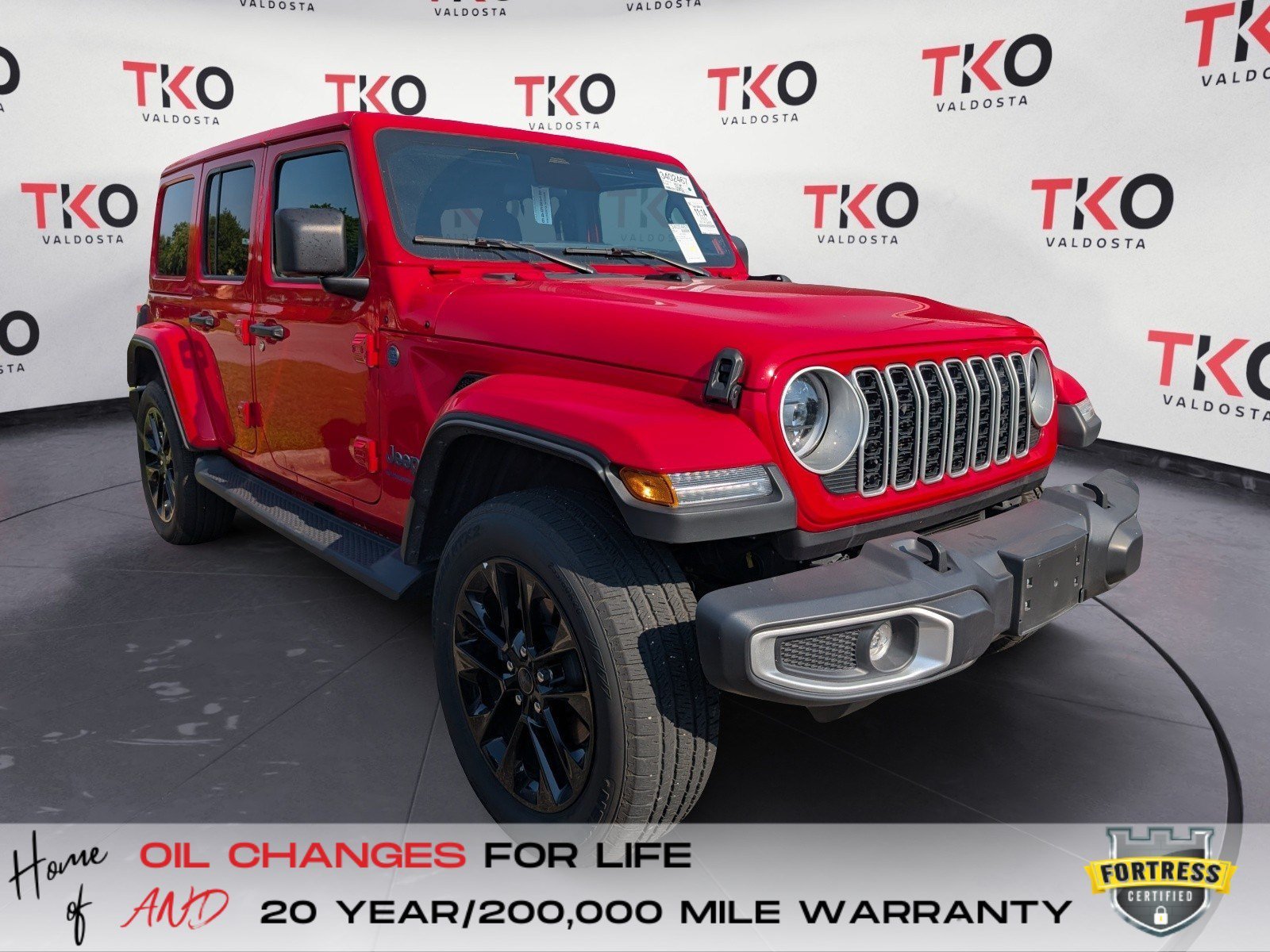 Used 2025 Firecracker Red Clearcoat Jeep Sahara image 1