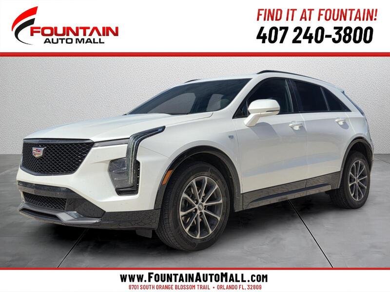 Used 2024 WHITE CADILLAC FWD 4DR SPORT image 1