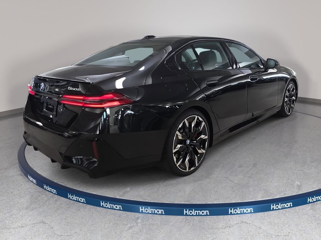 New 2027 Black Sapphire Metallic BMW 550e xDrive image 4