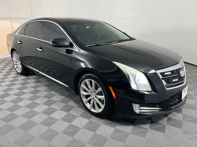 Used 2016 Black Raven Cadillac Luxury image 1