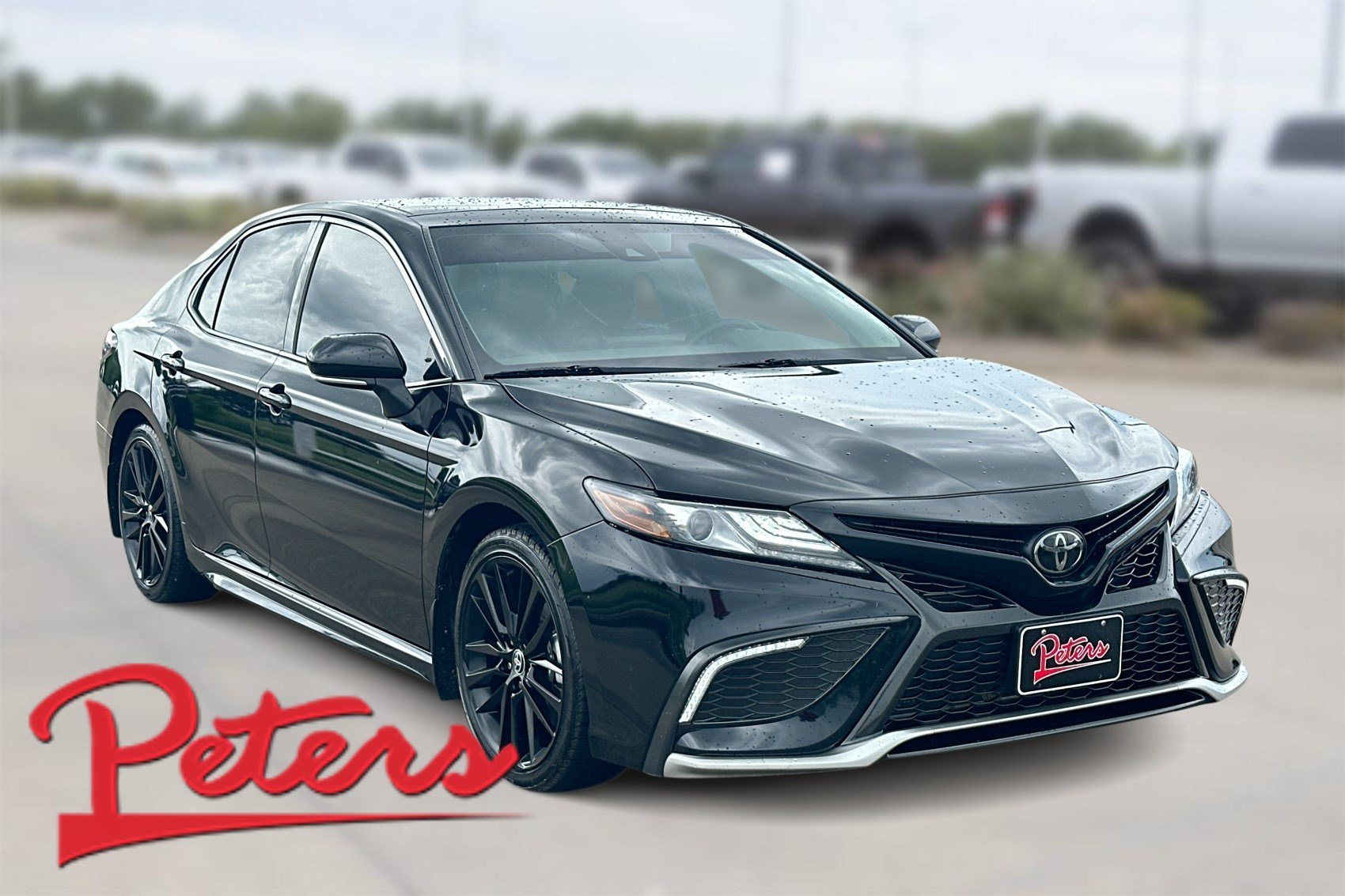 Used 2023 Midnight Black Metallic Toyota XSE image 1