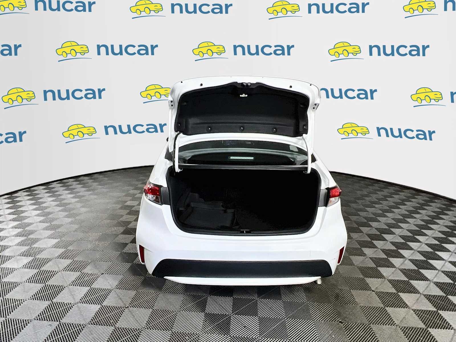 Used 2021 Super White Toyota LE image 24
