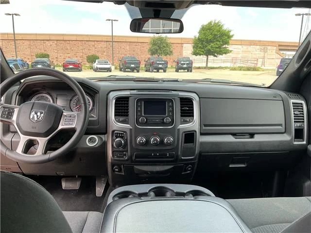 Used 2024 Flame Red Clearcoat RAM SLT 4x4 Crew Cab 5.6 ft. box 140 in. WB image 9