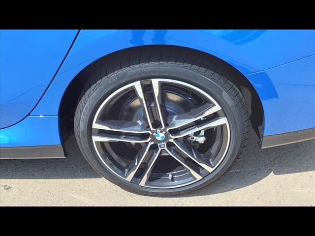 Used 2024 Misano Blue Metallic BMW 228i xDrive image 14