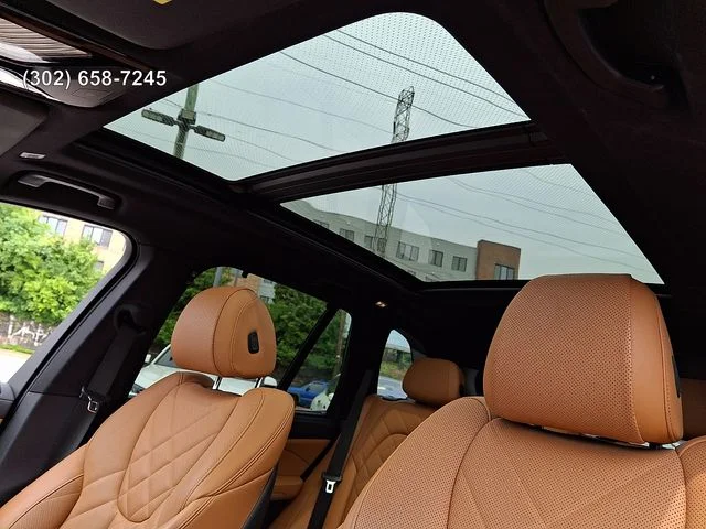 Certified Used 2023 Black Sapphire Metallic BMW xDrive40i image 13