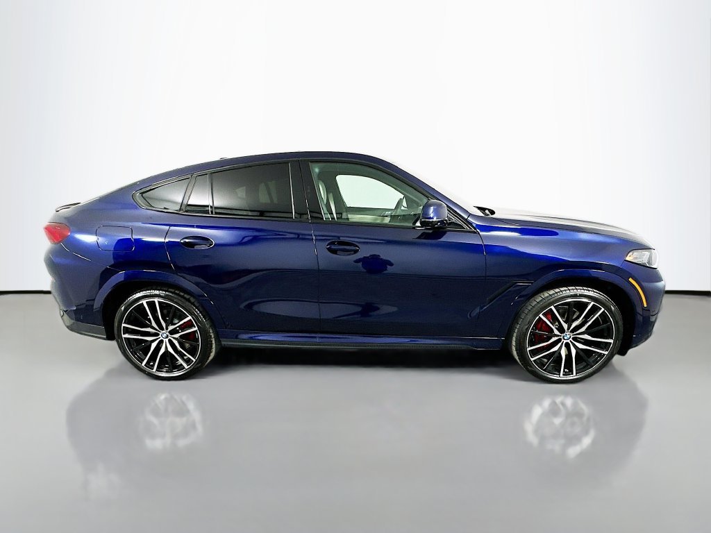 Used 2026 Tanzanite Blue II Metallic BMW xDrive40i image 4