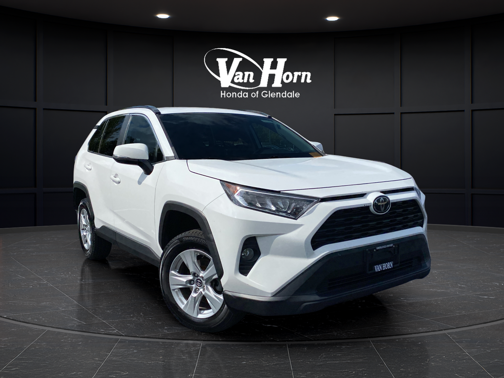 Used 2020 Super White Toyota XLE image 1