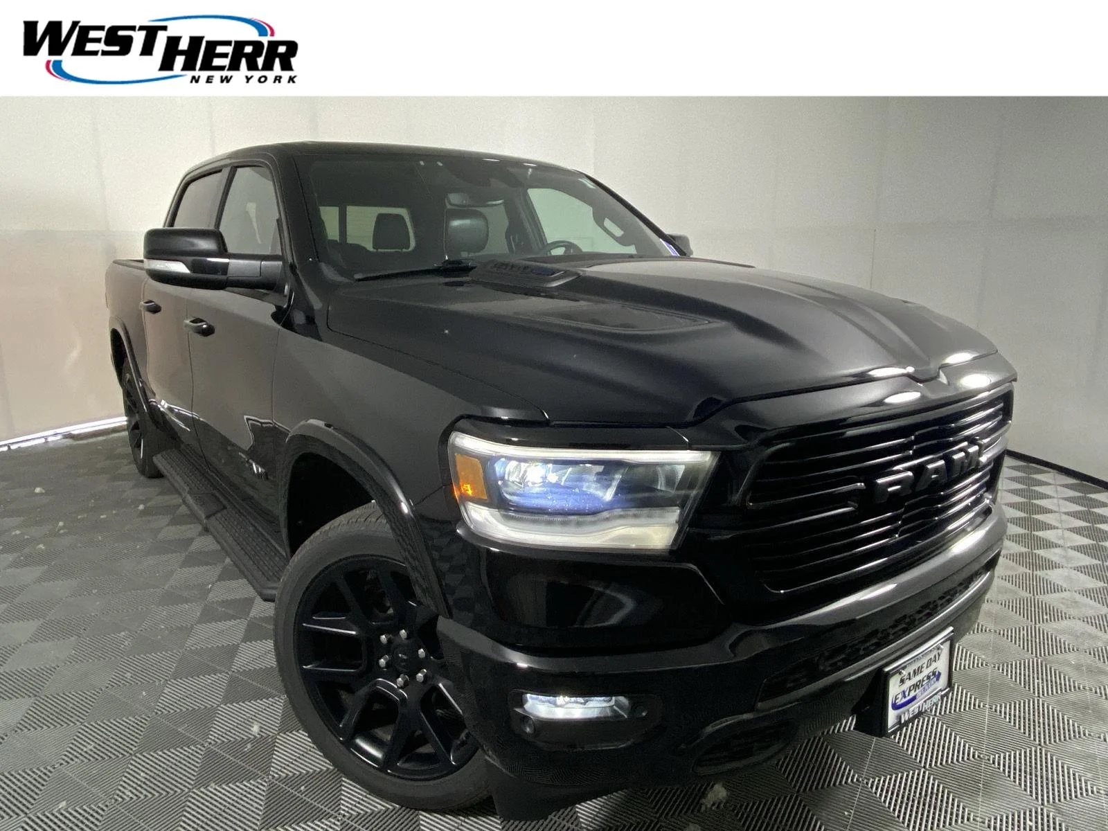 Used 2021 Diamond Black Crystal Pearlcoat Ram Laramie image 1
