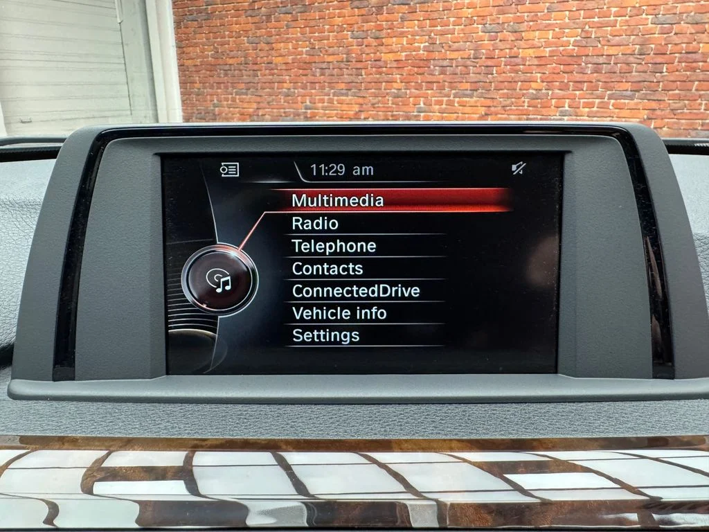 Used 2015 Black BMW 320i xDrive image 21