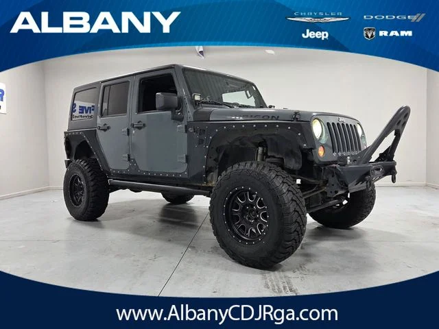 Used 2014 Gray Jeep Unlimited Rubicon image 1