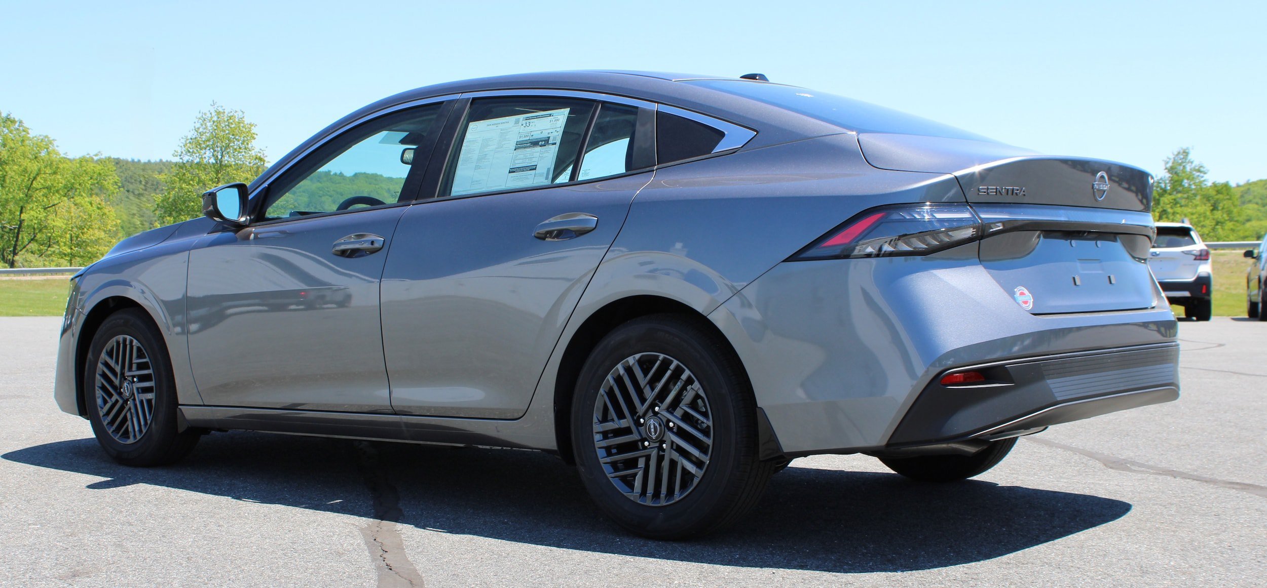 New 2026 Gun Metallic Nissan SV image 12