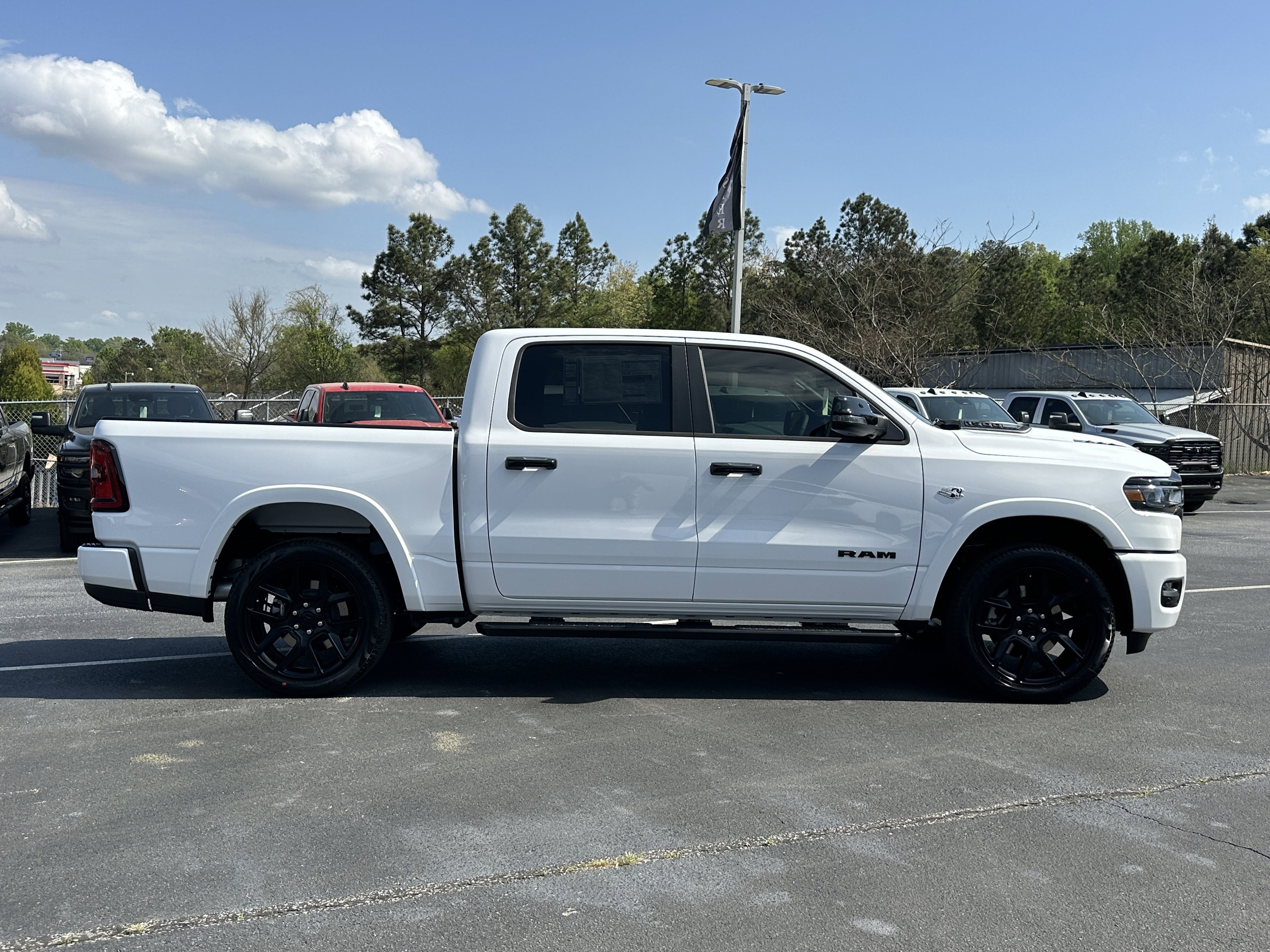 New 2026 Bright White Clear-Coat Exterior Paint RAM Laramie image 9