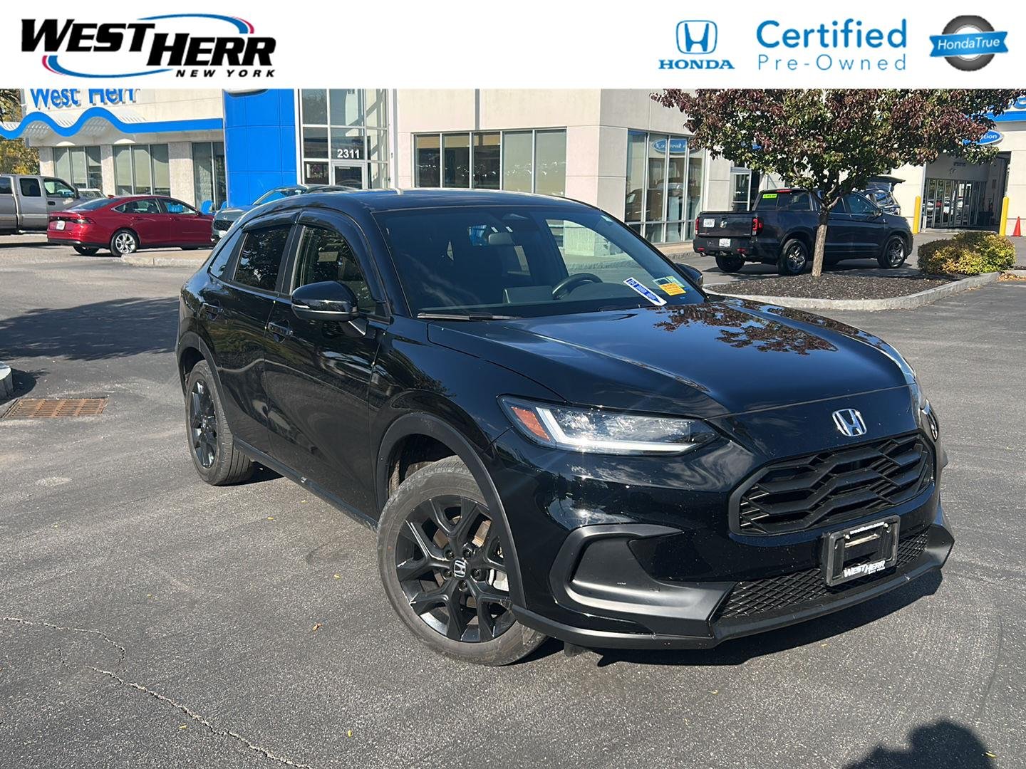 Used 2024 Crystal Black Pearl Honda Sport image 1