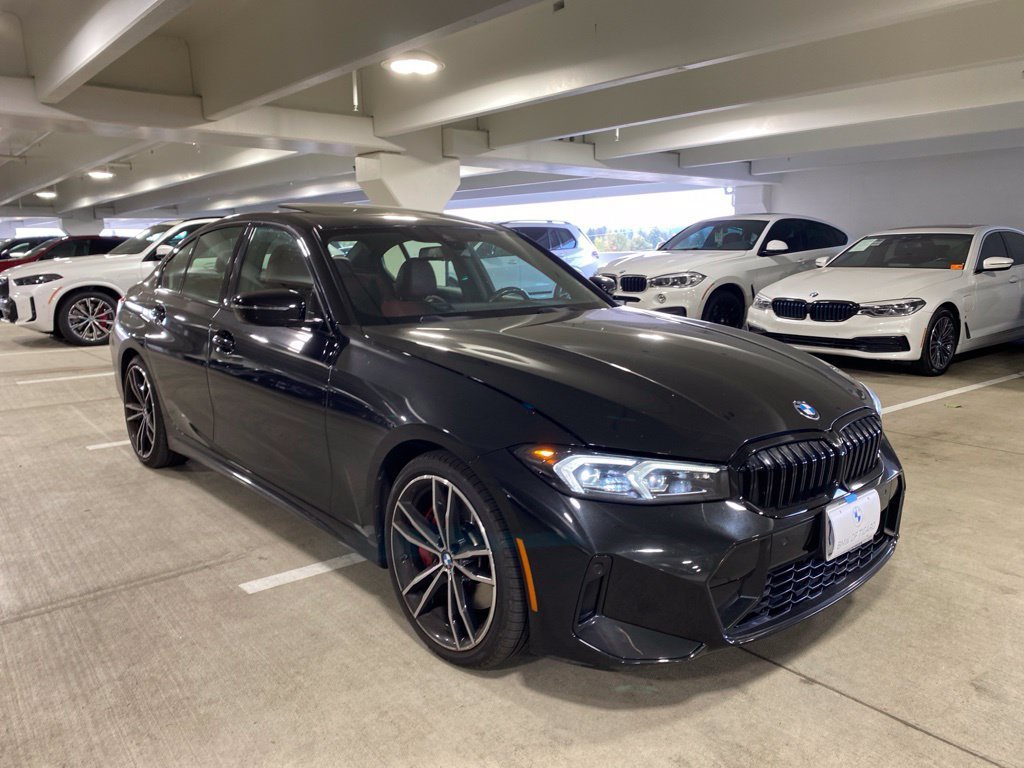 Used 2023 Black Sapphire Metallic BMW 330i xDrive image 3