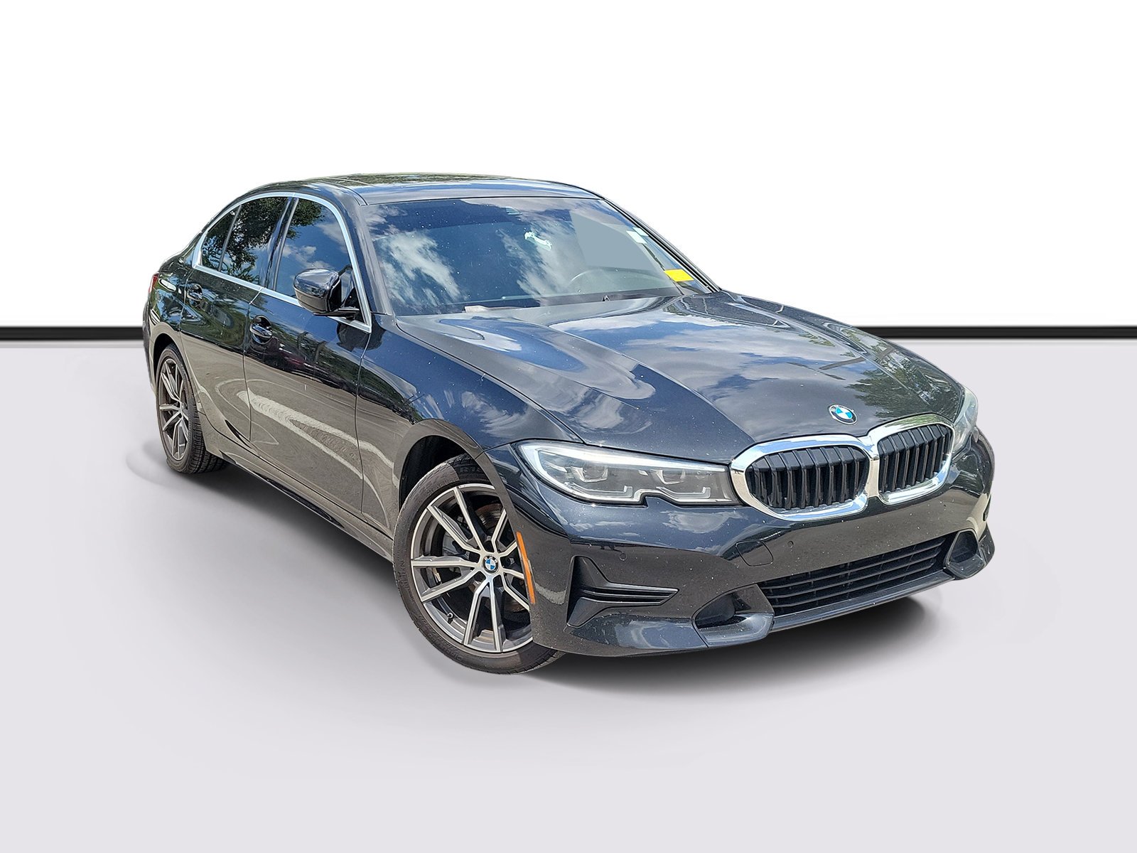 Used 2022 Black Sapphire Metallic BMW 330i image 1