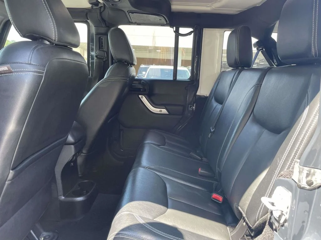 Used 2016 Black Jeep Unlimited Sahara image 19