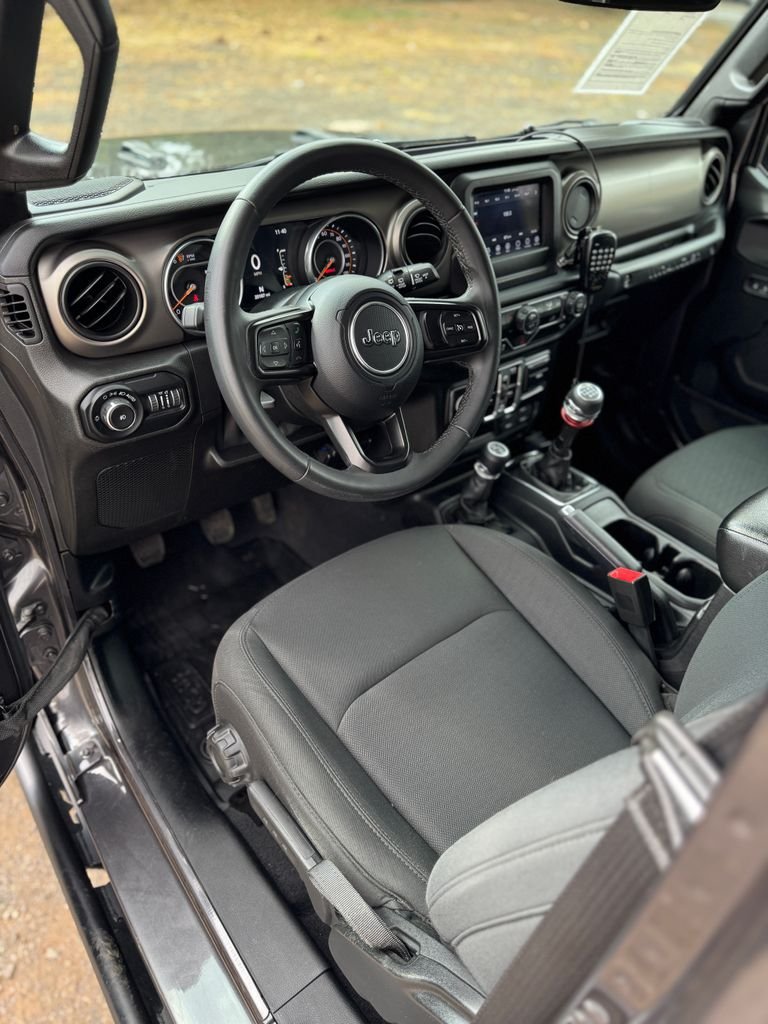 Used 2018 Granite Crystal Metallic Clearcoat Jeep Unlimited Sport S image 25