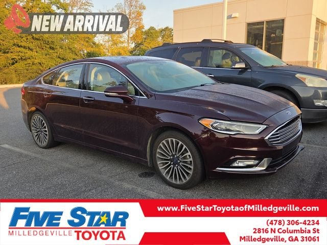Used 2017 Red Ford Titanium image 1
