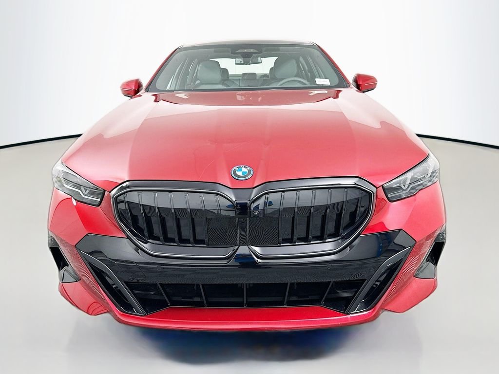New 2027 Vegas Red Metallic BMW 550e xDrive image 2