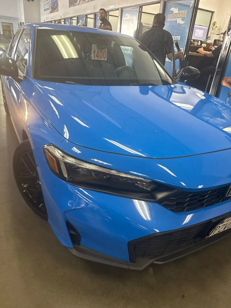Used 2025 Boost Blue Pearl Honda Sport image 1