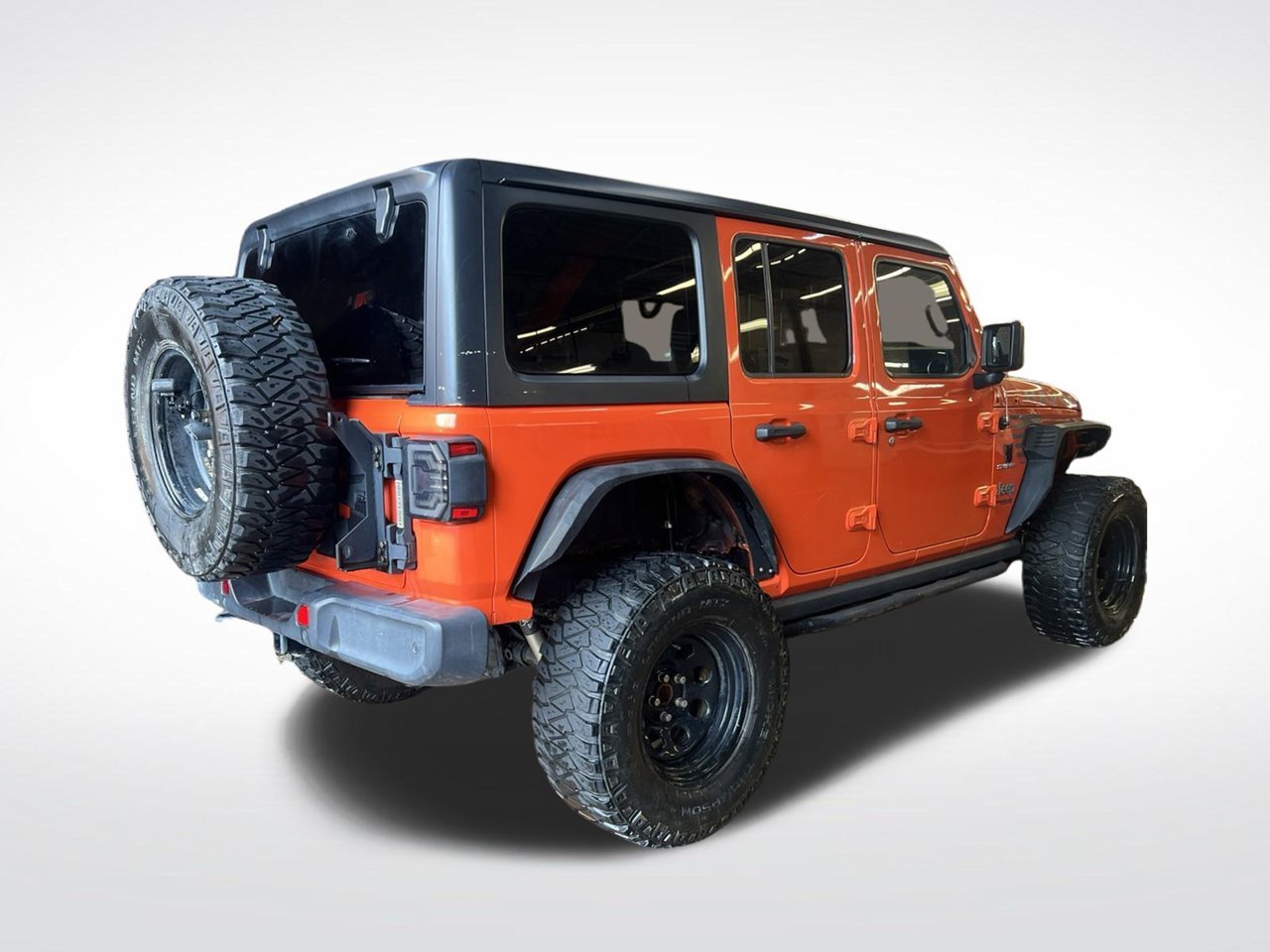 Used 2020 Orange Jeep Unlimited Sahara image 6
