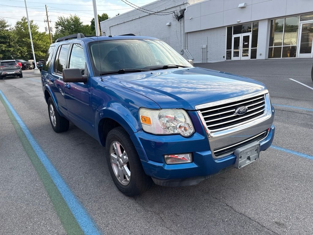 Used 2010 Blue Ford XLT image 1