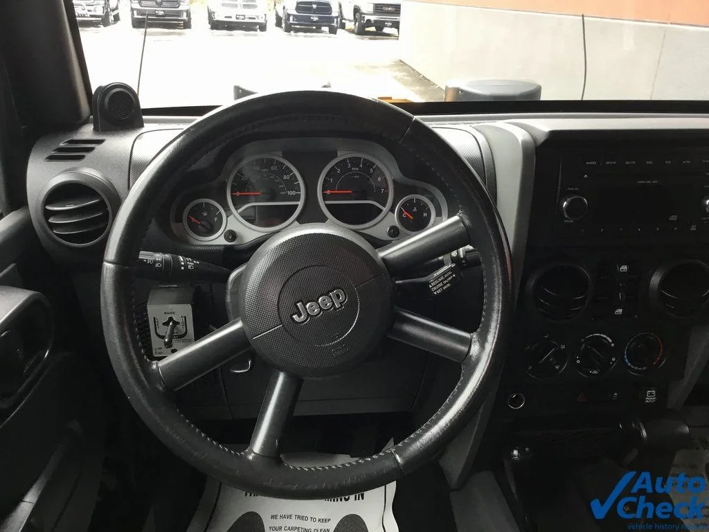 Used 2010 Black Jeep Unlimited Sport image 36