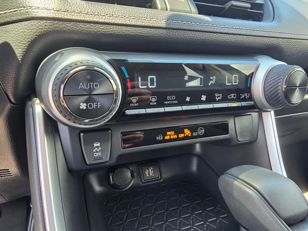 Used 2025 Midnight Black Metallic Toyota Hybrid LE image 19