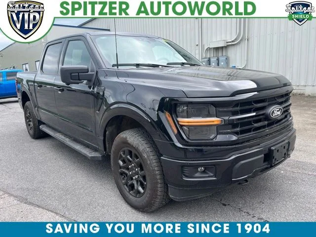 Used 2024 Agate Black Metallic Ford XLT image 1