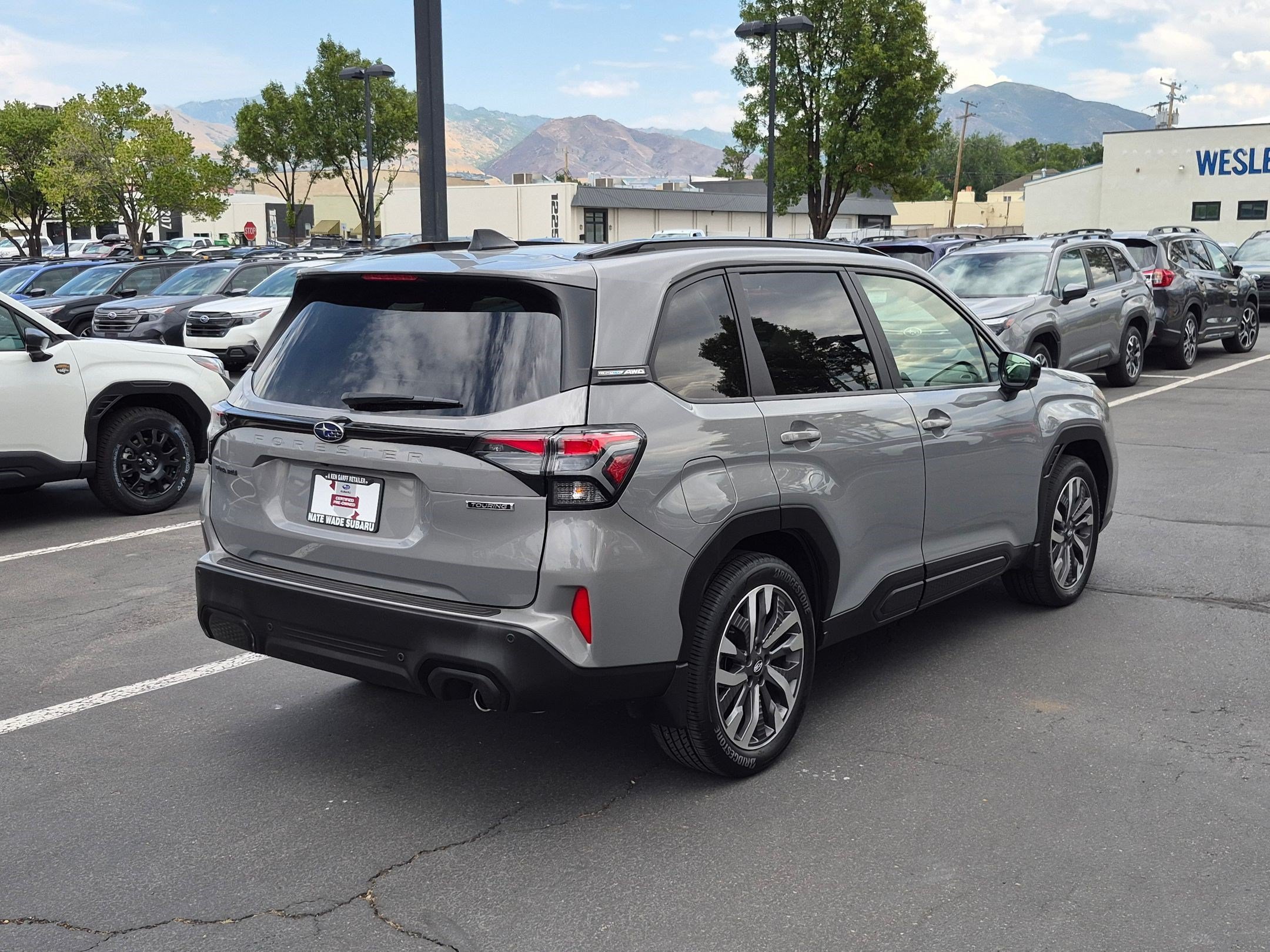 Certified Used 2025 River Rock Pearl Subaru Touring image 3