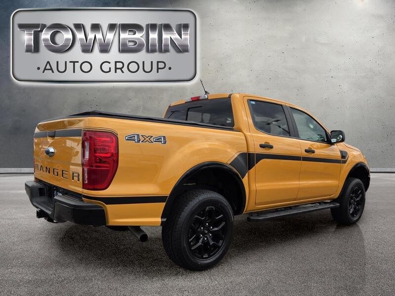 Used 2022 Orange Metallic FORD XLT 4WD SUPERCREW 5