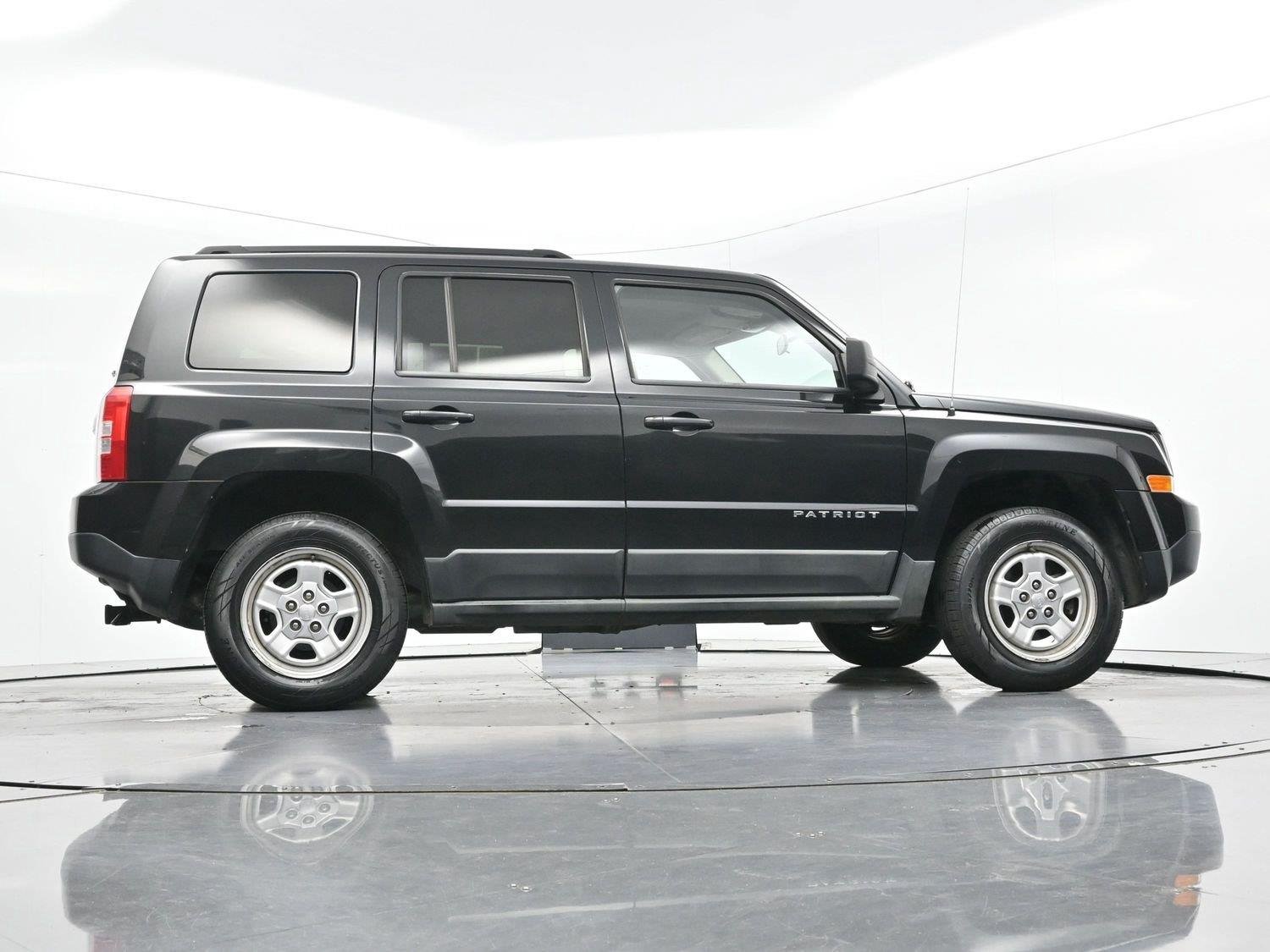 Used 2011 Brilliant Black Crystal Pearl Jeep Sport image 41