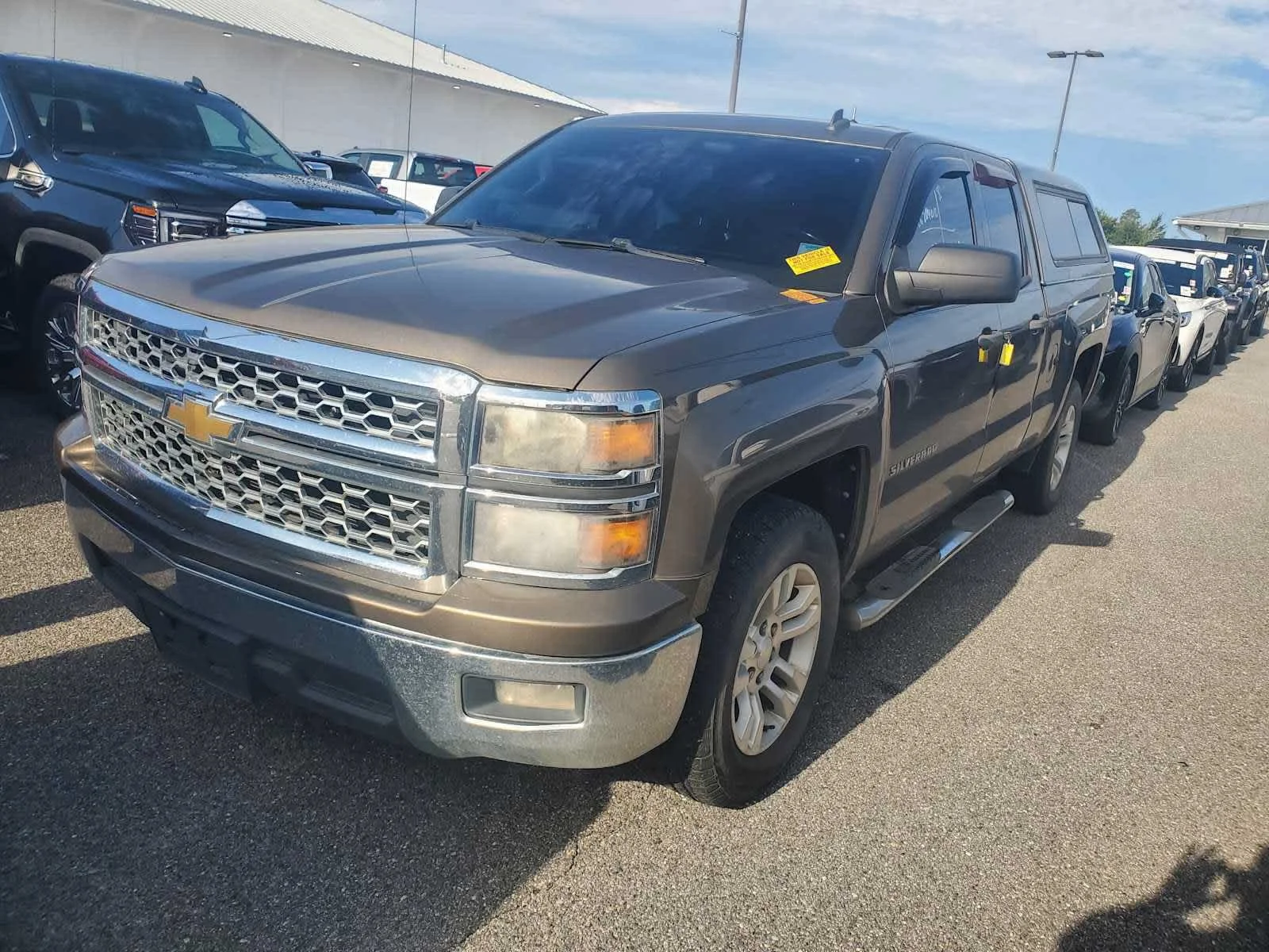 Used 2014 BROWNSTONE METALLIC Chevrolet LT image 1
