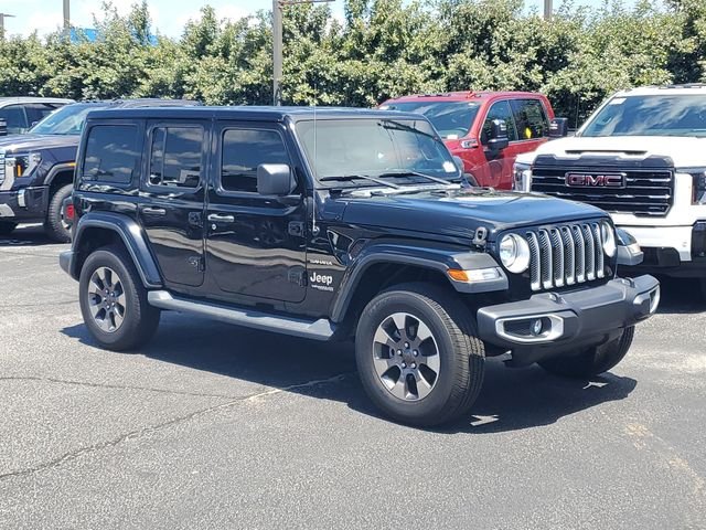 Used 2020 Black Jeep Unlimited Sahara image 1