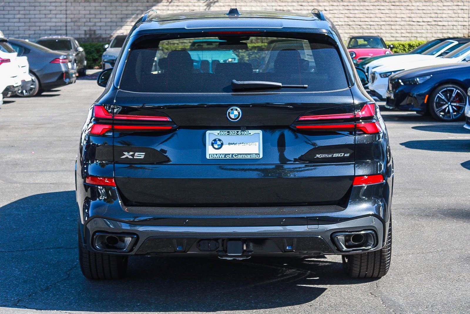 New 2026 Black Sapphire Metallic BMW xDrive50e image 5