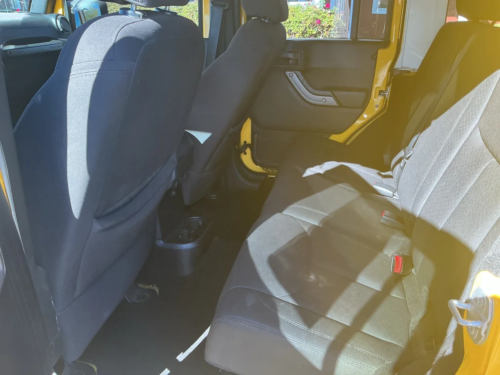 Used 2015 Baja Yellow Jeep Sport image 14