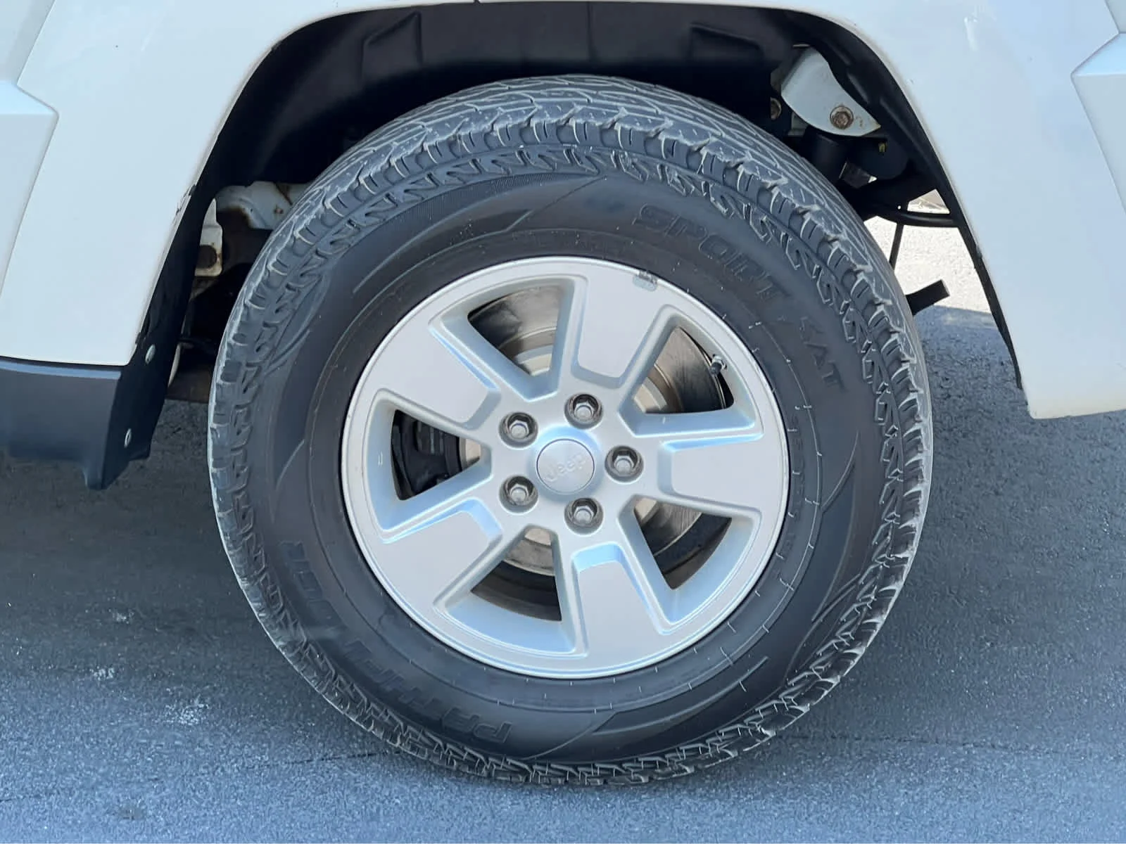 Used 2010 Stone White Clearcoat Jeep Sport image 14