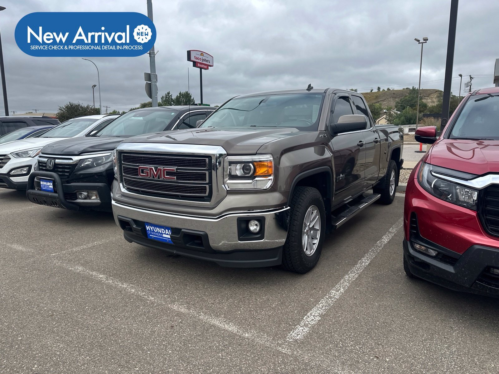 Used 2014 Brown GMC SLE image 1