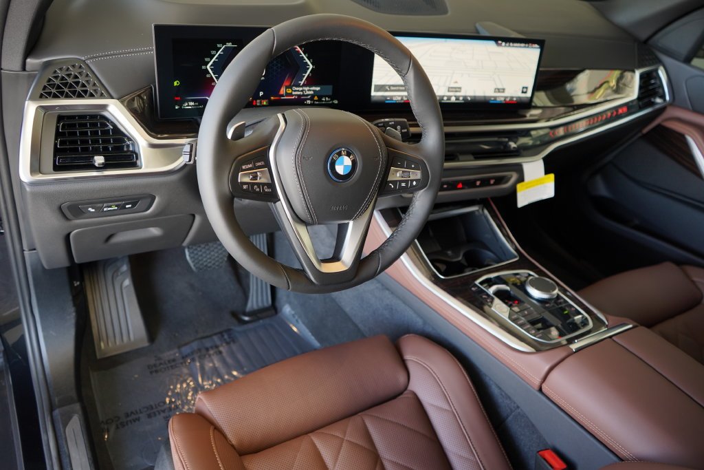 Used 2026 Black Sapphire Metallic BMW xDrive50e image 13