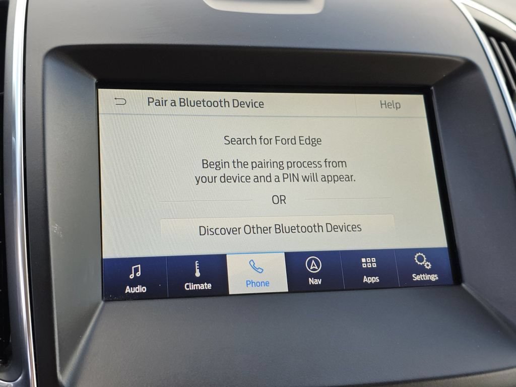 Used 2020 White Metallic Ford Titanium image 13