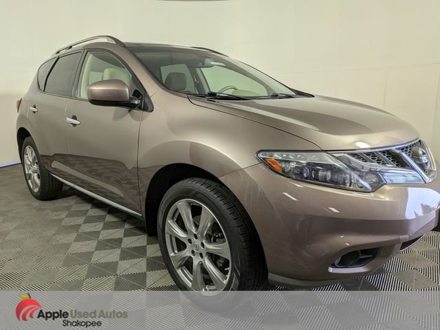 Used 2013 Brown Nissan LE image 1