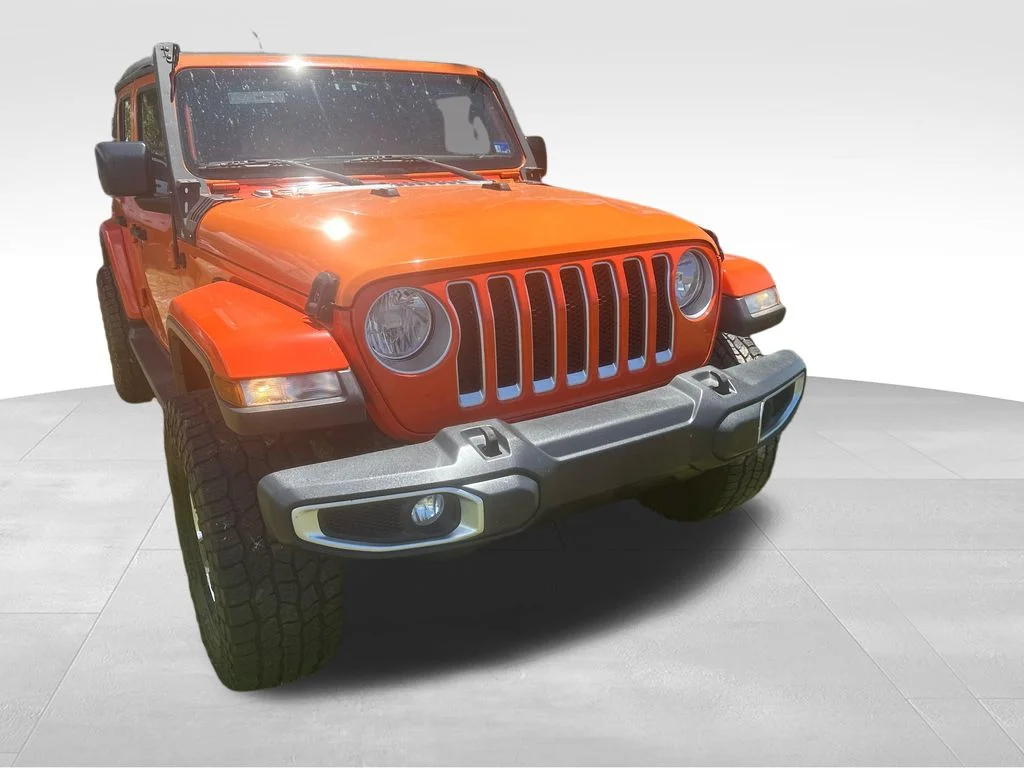 Used 2018 Orange Jeep Unlimited Sahara image 32