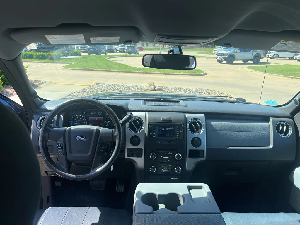 Used 2013 Ford F-150 XLT with VIN 1FTFX1ET7DFB30309 for sale in Pella, IA