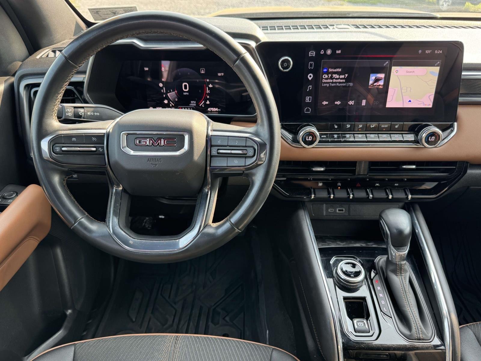 Used 2023 Desert Sand Metallic GMC 4WD AT4 image 2