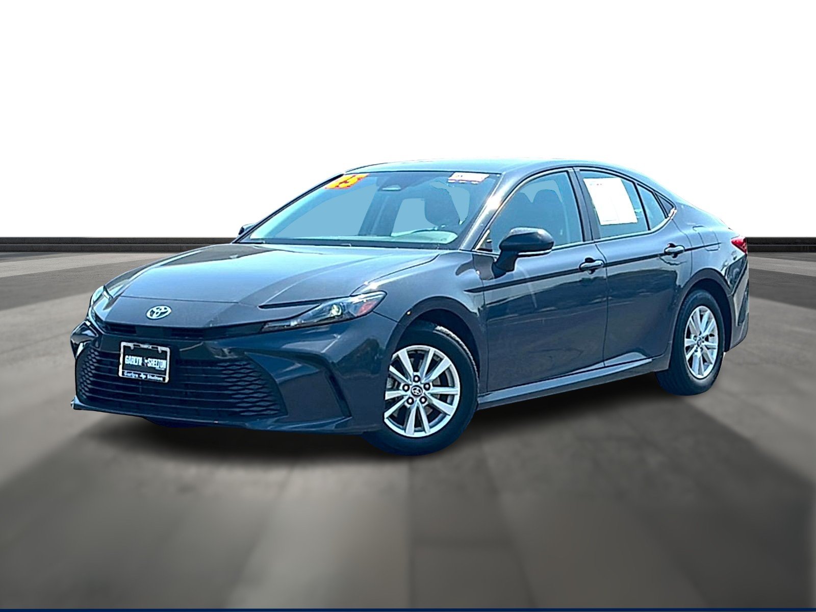 Used 2025 Super Black Toyota LE image 1